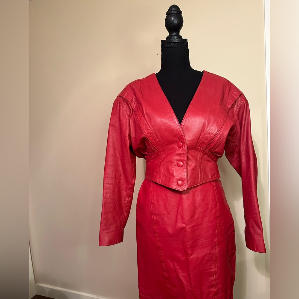 Vintage 80’s red leather skirt suit. Classic huge shoulders waist detail size M